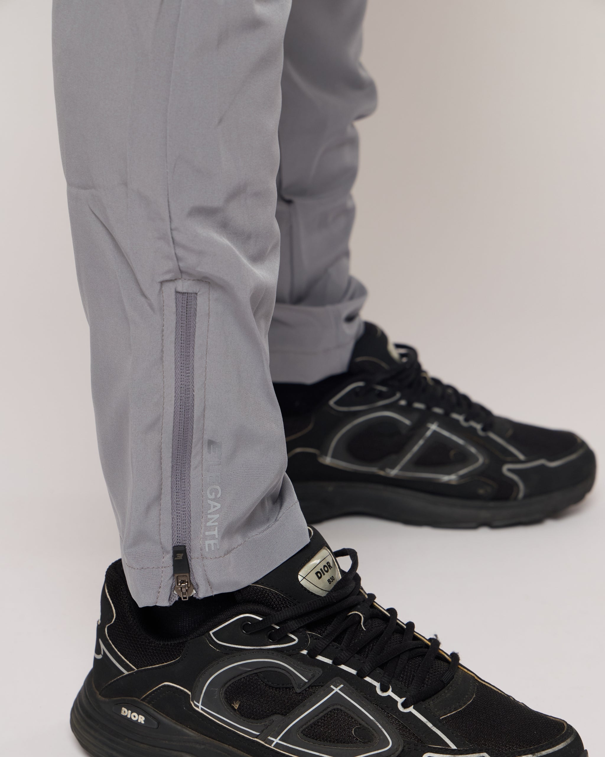 grey tracksuit joggers with black trainers