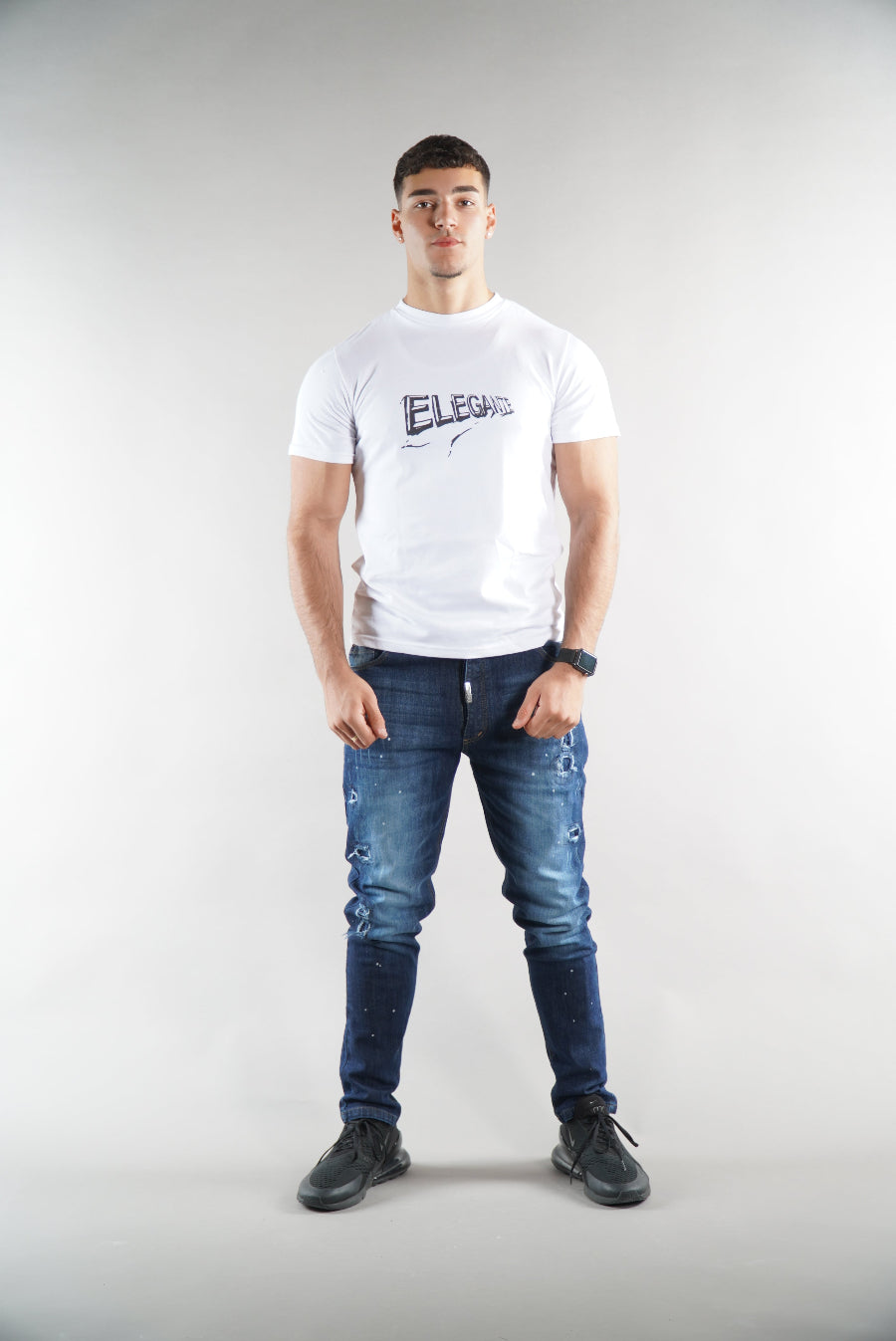 man wearing Elegante Denim Jeans and white tshirt on white background
