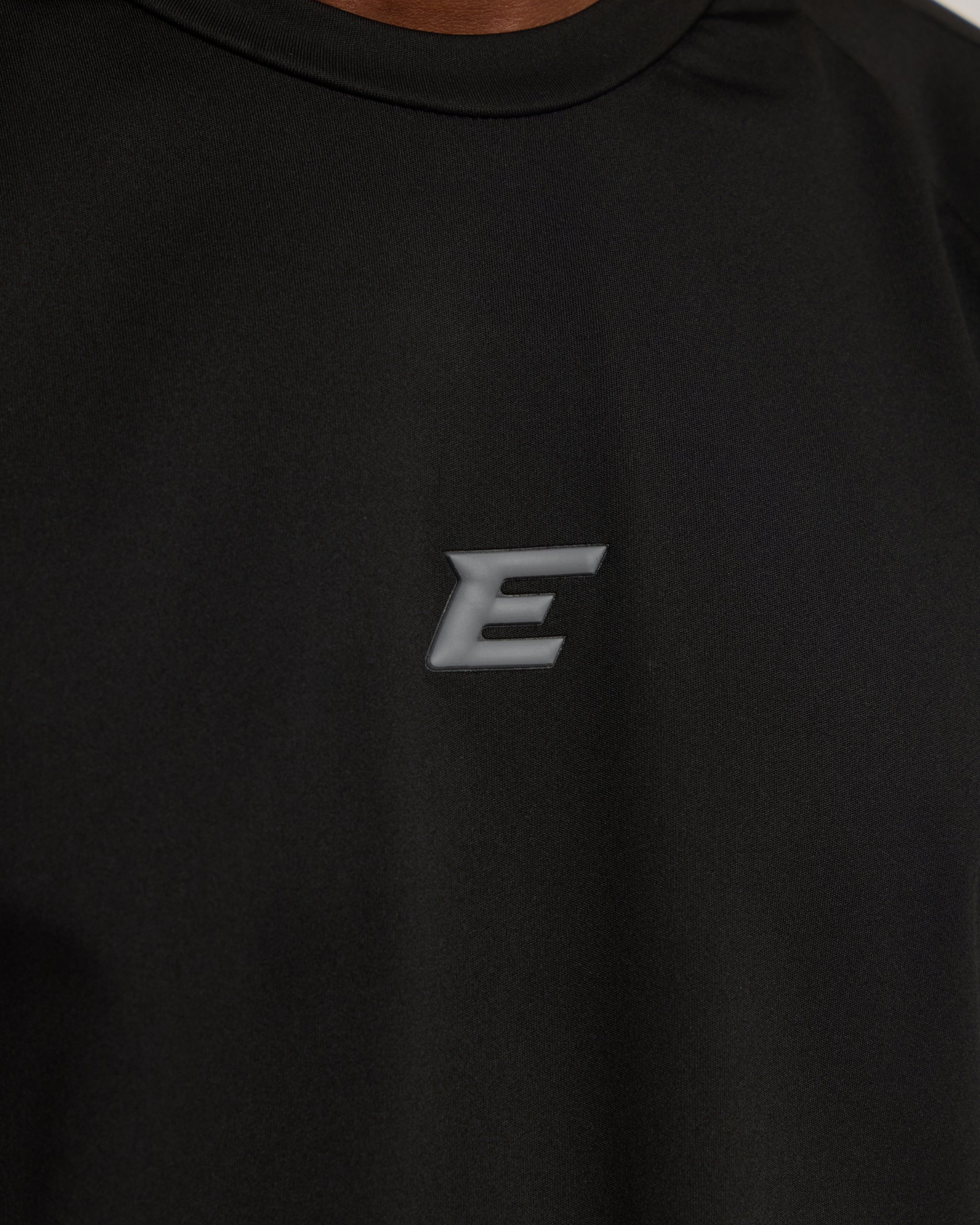 Black sweatshirt with a logo on the chest