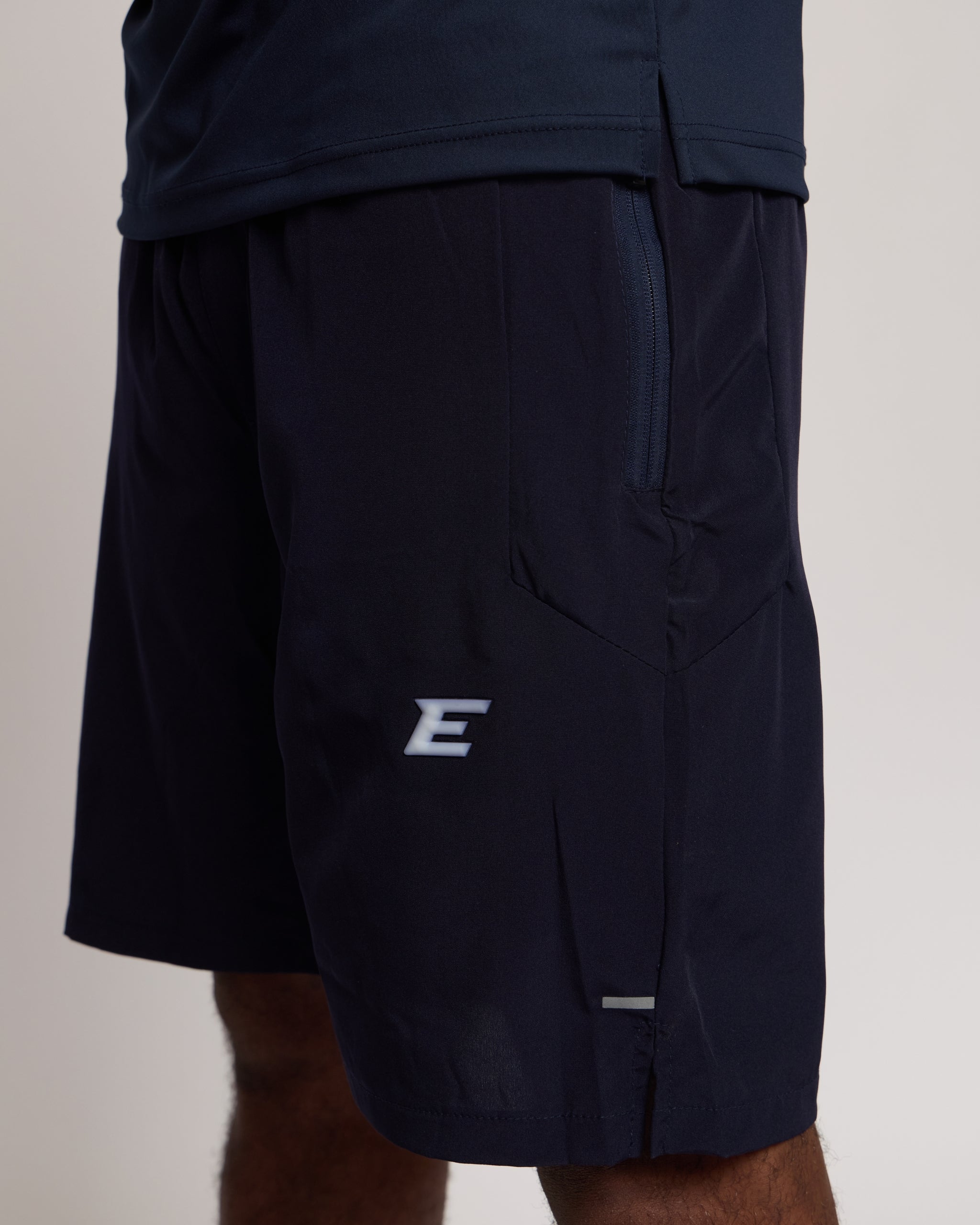 Mens Navy shorts with a white 'E' logo on a plain background