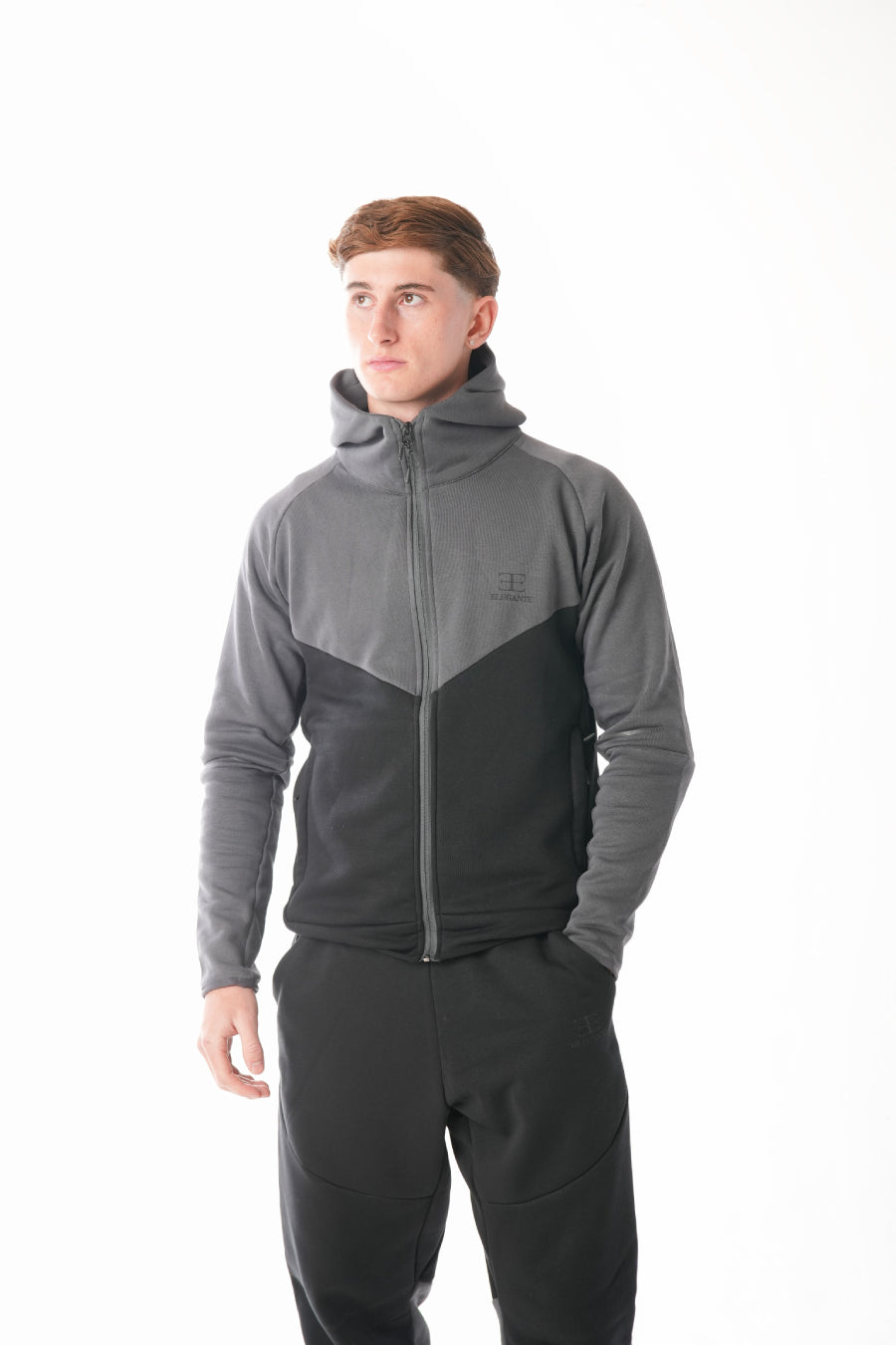 Man wearing Black steel grey Tracksuit on white background