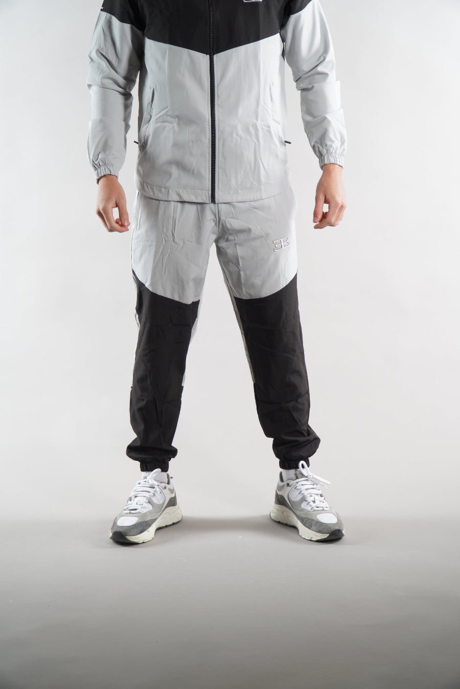 man wearing Black Grey Joggers and jacket Tracksuit set