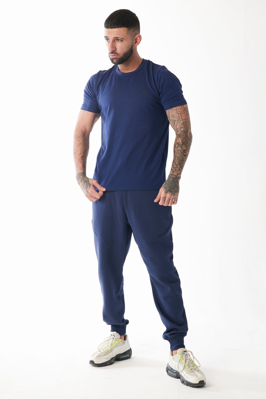 man wearing navy t-shirt