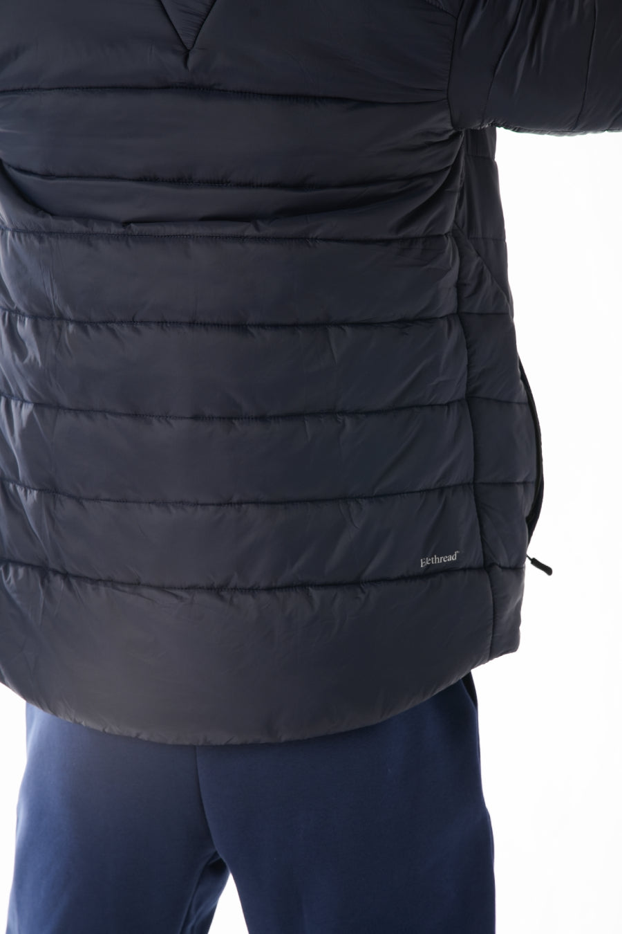 Navy puffer jacket with a brand logo on a white background
