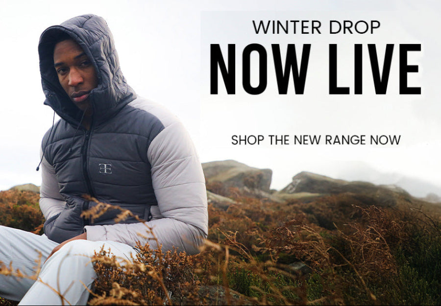 man wearing grey puffer jacket banner